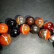 lávakő-és-tigrsszem-ásvány-ékszerszett-dobozban